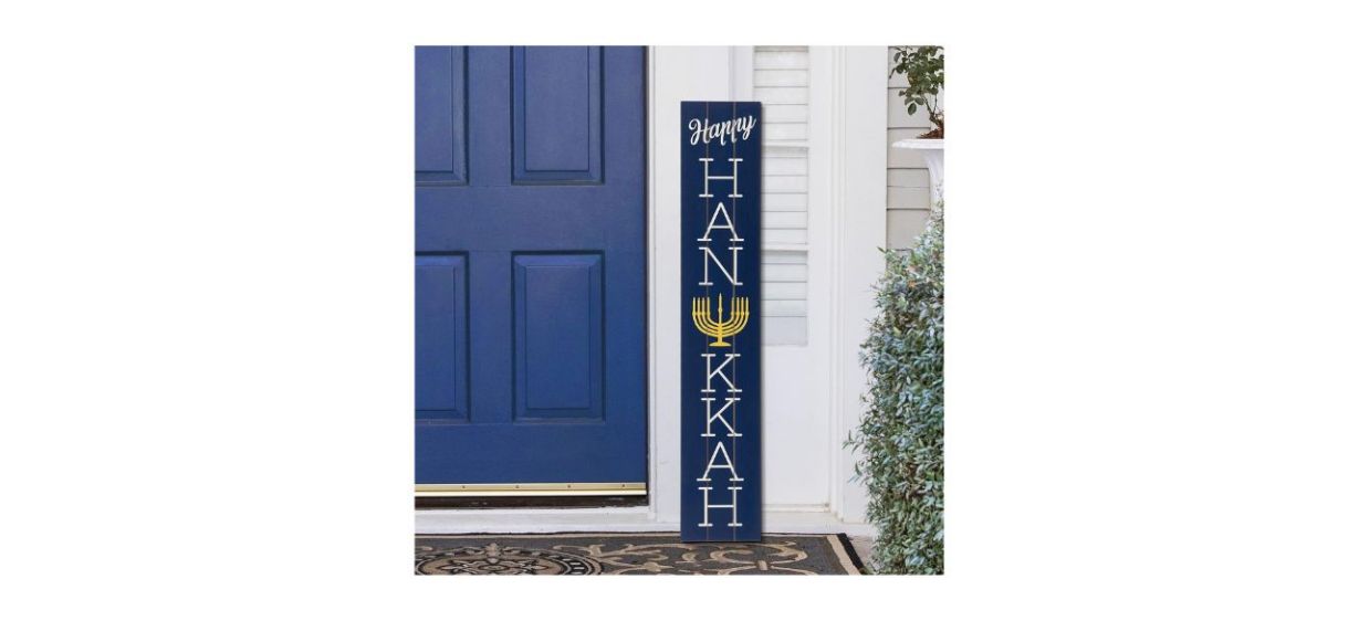 Glitzhome Hanukkah Wooden Porch Sign, hanging vertically on a porch