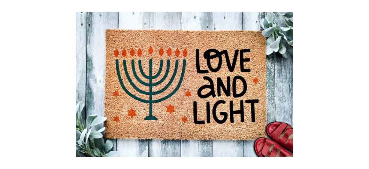 WoodByStu Love and Light Hanukkah Doormat with picture of menorah on it, text reads "love and light"